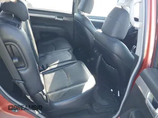 2009 Kia Borrego LX with VIN KNDJH741295034028, listed as a IAAI auction lot 41371961 with 99,785 mi miles. Bid and sale history available at carsss.com. Image 8.
