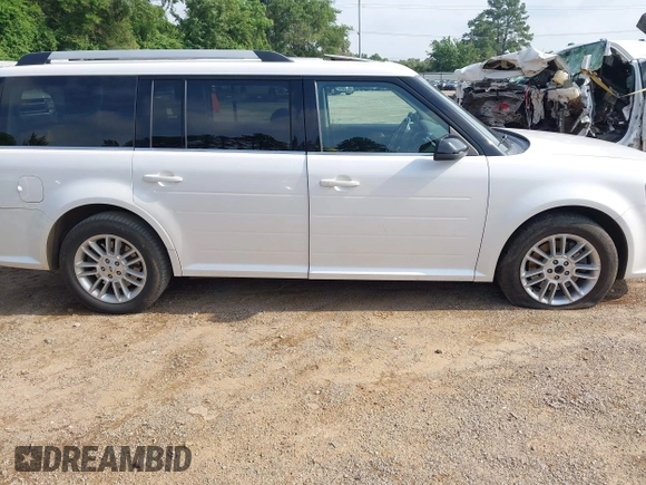 2014 Ford Flex SEL z VIN 2FMGK5C8XEBD00203, wystawiony jako IAAI lot #42304671 z przebiegiem 109 639 mil mil oraz . Historia ofert i sprzedaży dostępna na DreamBid. Obrazek 13.