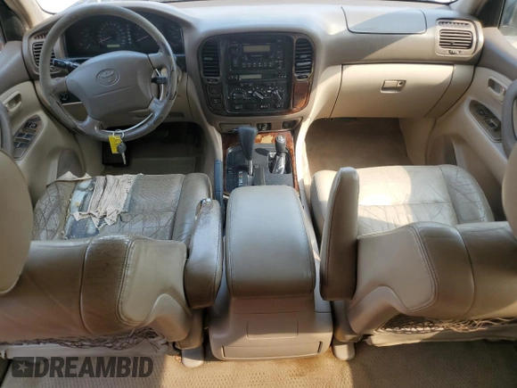1999 Toyota Land Cruiser z VIN JT3HT05J8X0047612, wystawiony jako Copart lot #60983565 z przebiegiem 390 718 mil mil oraz Czysty tytuł • Clean title. Historia ofert i sprzedaży dostępna na DreamBid. Obrazek 8.