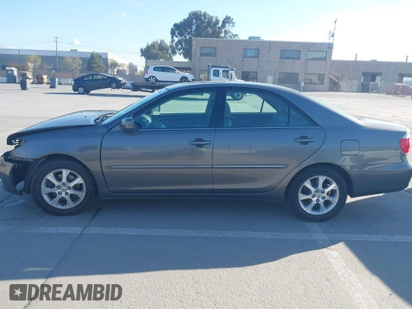 2005 Toyota Camry LE with VIN 4T1BF30K55U619313, listed as a IAAI auction lot 41854001 with 89,982 mi miles and . Bid and sale history available at DreamBid. Image 15.