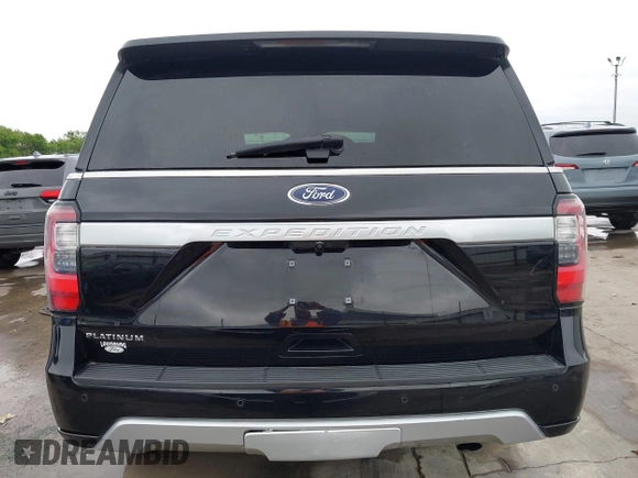 2019 Ford Expedition Platinum with VIN 1FMJU1MT8KEA02325, listed as a IAAI auction lot 41861772 with 77,124 mi miles. Bid and sale history available at carsss.com. Image 17.