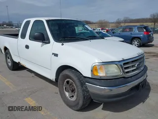 2003 Ford F-150 XL with VIN 1FTRX17293NB39194, listed as a IAAI auction lot 41855463 with 253,292 mi miles. Bid and sale history available at carsss.com. Image 1.