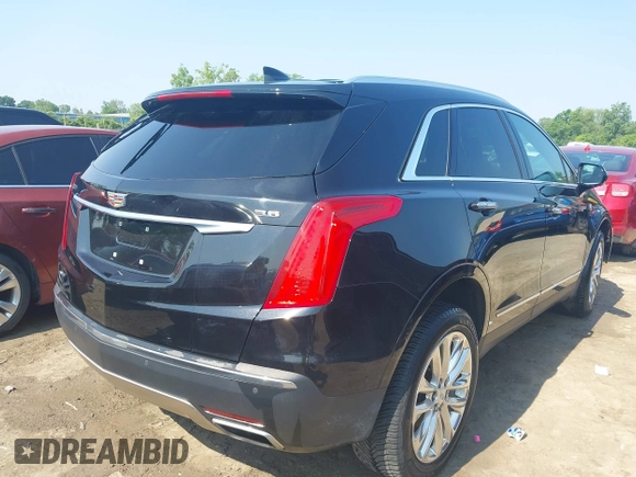 2017 Cadillac XT5 Platinum AWD with VIN 1GYKNFRS6HZ130626, listed as a IAAI auction lot 42470536 with 128,129 mi miles and . Bid and sale history available at DreamBid. Image 4.