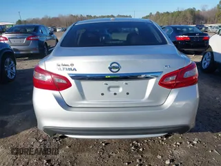 2018 Nissan Altima S with VIN 1N4AL3AP2JC239743, listed as a IAAI auction lot 41683606 with 141,354 mi miles and . Bid and sale history available at DreamBid. Image 16.