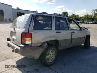 1994 Jeep Grand Cherokee Laredo z VIN 1J4GZ58S5RC328902, wystawiony jako Copart lot #70150474 z przebiegiem 195 604 mil mil oraz Szkoda całkowita • Salvage title. Historia ofert i sprzedaży dostępna na DreamBid. Obrazek 3.