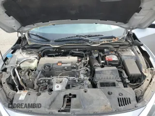 2017 Honda Civic LX z VIN 2HGFC2F52HH551152, wystawiony jako Copart lot #52728275 z przebiegiem 64 376 mil mil oraz Szkoda całkowita • Salvage title. Historia ofert i sprzedaży dostępna na DreamBid. Obrazek 11.