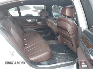 2018 BMW 7 Series 740i xDrive with VIN WBA7E4C59JGV23876, listed as a IAAI auction lot 41381398 with 106,675 mi miles. Bid and sale history available at carsss.com. Image 8.