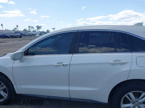 2013 Acura RDX Technology z VIN 5J8TB4H55DL005103, wystawiony jako IAAI lot #41976789 z przebiegiem 161 140 mil mil oraz . Historia ofert i sprzedaży dostępna na DreamBid. Obrazek 14.