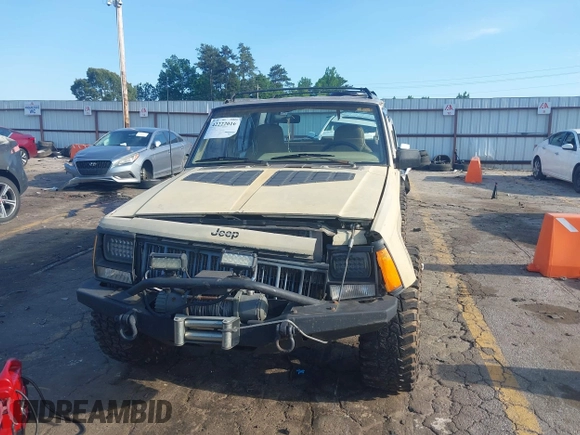 1995 Jeep Cherokee Sport with VIN 1J4FJ68S3SL555908, listed as a IAAI auction lot 42222016 with 283,444 mi miles and . Bid and sale history available at DreamBid. Image 6.