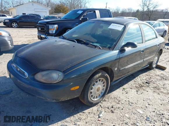 1998 Mercury Sable LS Premium Group with VIN 1MEFM53S0WA638842, listed as a IAAI auction lot 41557457 with 153,443 mi miles and . Bid and sale history available at DreamBid. Image 2.