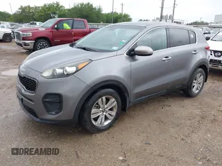 2017 Kia Sportage LX with VIN KNDPM3AC6H7233672, listed as a IAAI auction lot 42215738 with 130,112 mi miles and . Bid and sale history available at carsss.com. Image 2.
