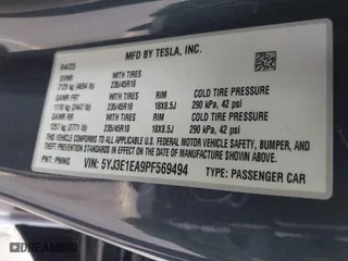 2023 Tesla Model 3 with VIN 5YJ3E1EA9PF569494, listed as a IAAI auction lot 41798014 with 18,372 mi miles. Bid and sale history available at carsss.com. Image 9.