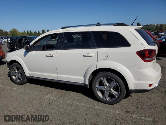 2017 Dodge Journey Crossroad Plus with VIN 3C4PDCGGXHT602670, listed as a Copart auction lot 54556675 with 179,702 mi miles and Salvage title. Bid and sale history available at DreamBid. Image 2.
