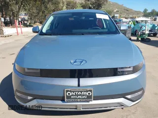 2024 Hyundai Ioniq 5 SE z VIN KM8KM4DE3RU316276, wystawiony jako IAAI lot #41859525 z przebiegiem 17 063 mil mil oraz . Historia ofert i sprzedaży dostępna na DreamBid. Obrazek 13.