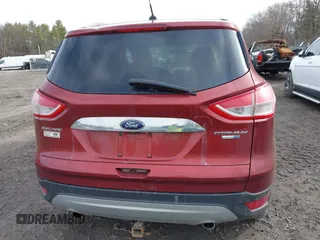 2015 Ford Escape Titanium with VIN 1FMCU9JX1FUA56091, listed as a IAAI auction lot 41947035 with 191,297 mi miles and . Bid and sale history available at DreamBid. Image 16.