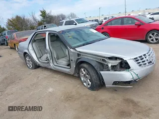 2006 Cadillac DTS 1SB z VIN 1G6KD57Y66U194690, wystawiony jako IAAI lot #41714291 z przebiegiem 170 304 mil mil oraz . Historia ofert i sprzedaży dostępna na DreamBid. Obrazek 1.