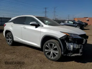 2017 Lexus RX with VIN JTJBZMCA6H2017585, listed as a Copart auction lot 49061465 with 119,947 mi miles and Salvage Title. Bid and sale history available at carsss.com. Image 4.