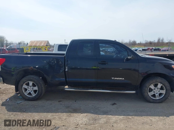 2010 Toyota Tundra 4WD Truck with VIN 5TFUM5F14AX015516, listed as a IAAI auction lot 42118639 with 204,489 mi miles. Bid and sale history available at carsss.com. Image 13.