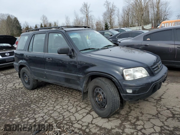 1999 Honda CR-V LX with VIN JHLRD1846XC008382, listed as a Copart auction lot 45989265 with 310,015 mi miles and Salvage Title. Bid and sale history available at carsss.com. Image 4.