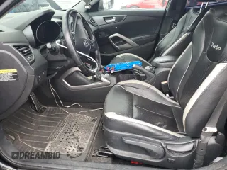 2013 Hyundai Veloster Turbo z VIN KMHTC6AE4DU155792, wystawiony jako Copart lot #83189014 z przebiegiem 70 033 mil mil oraz Szkoda całkowita • Salvage title. Historia ofert i sprzedaży dostępna na DreamBid. Obrazek 7.