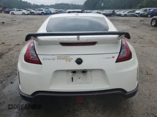 2014 Nissan 370Z with VIN JN1AZ4EH2EM633845, listed as a Copart auction lot 63583194 with 0 mi miles and Salvage Title. Bid and sale history available at carsss.com. Image 6.