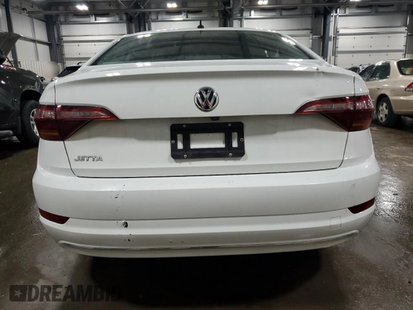 2019 Volkswagen Jetta S с VIN 3VWC57BU7KM013414, выставлен на аукционе Copart как лот 57952695 с пробегом 105 177 миль миль и Списание • Salvage title. История ставок и продаж доступна на DreamBid. Изображение 6.