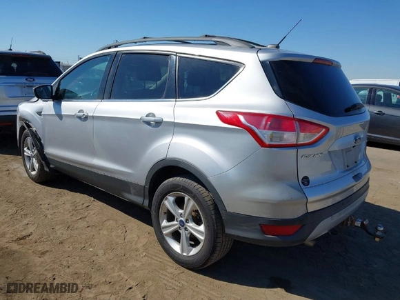 2015 Ford Escape SE with VIN 1FMCU9G99FUA44456, listed as a IAAI auction lot 40526412 with 94,998 mi miles. Bid and sale history available at carsss.com. Image 3.