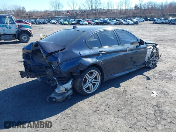2013 BMW 5 Series 535i xDrive with VIN WBAFU7C52DDU70203, listed as a IAAI auction lot 41706253 with Not provided miles and . Bid and sale history available at DreamBid. Image 4.