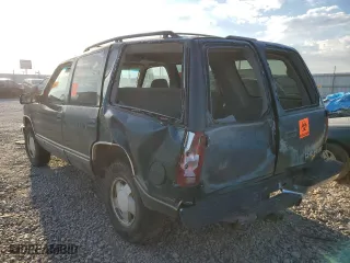 1999 Chevrolet Tahoe Z71 with VIN 1GNEK13R0XJ512661, listed as a Copart auction lot 68022173 with 181,573 mi miles and Salvage Title. Bid and sale history available at carsss.com. Image 2.