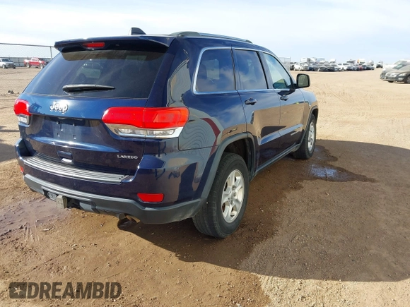 2014 Jeep Grand Cherokee Laredo with VIN 1C4RJEAGXEC206879, listed as a IAAI auction lot 41073934 with 160,457 mi miles. Bid and sale history available at carsss.com. Image 4.