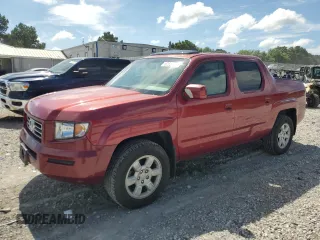 2006 Honda Ridgeline RTL with VIN 2HJYK165X6H524486, listed as a Copart auction lot 62884235 with 209,787 mi miles and Salvage title. Bid and sale history available at DreamBid. Image 1.