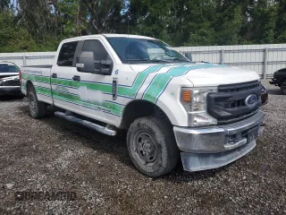 2020 Ford F-250 XL with VIN 1FT7W2BT4LED53378, listed as a Copart auction lot 62114495 with 96,636 mi miles and Salvage title. Bid and sale history available at DreamBid. Image 4.
