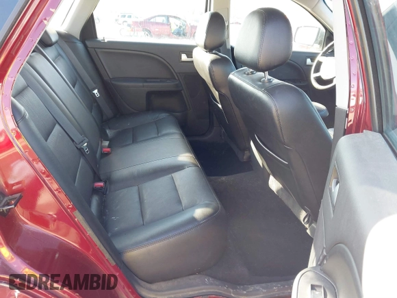 2006 Ford Five Hundred Limited z VIN 1FAFP28106G180763, wystawiony jako IAAI lot #41672882 z przebiegiem 127 357 mil mil oraz . Historia ofert i sprzedaży dostępna na DreamBid. Obrazek 8.