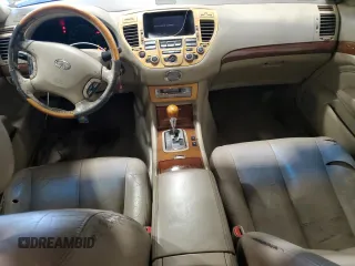 2002 Infiniti Q45 z VIN JNKBF01A62M002926, wystawiony jako Copart lot #73206924 z przebiegiem Nie podano mil oraz Szkody całkowita. Historia ofert i sprzedaży dostępna na DreamBid. Obrazek 8.