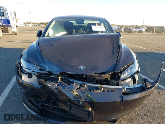 2024 Tesla Model 3 with VIN 5YJ3E1EA7RF853483, listed as a IAAI auction lot 40863575 with 1,173 mi miles and . Bid and sale history available at carsss.com. Image 12.