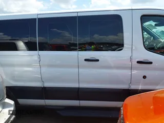 2019 Ford Transit Passenger XL with VIN 1FBZX2ZM8KKA53769, listed as a IAAI auction lot 42005385 with 62,118 mi miles and . Bid and sale history available at DreamBid. Image 13.