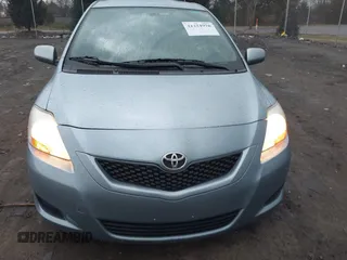 2009 Toyota Yaris z VIN JTDBT903591332683, wystawiony jako IAAI lot #41224976 z przebiegiem 113 305 mil mil oraz . Historia ofert i sprzedaży dostępna na DreamBid. Obrazek 12.