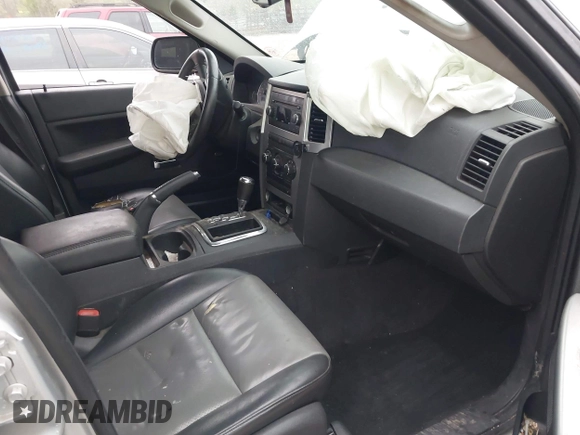 2009 Jeep Grand Cherokee Laredo with VIN 1J8GR48K09C557139, listed as a IAAI auction lot 41994604 with 1 mi miles. Bid and sale history available at carsss.com. Image 5.
