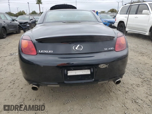 2003 Lexus SC 430 z VIN JTHFN48Y030039882, wystawiony jako Copart lot #50581485 z przebiegiem 43 439 mil mil oraz Szkoda całkowita • Salvage title. Historia ofert i sprzedaży dostępna na DreamBid. Obrazek 6.