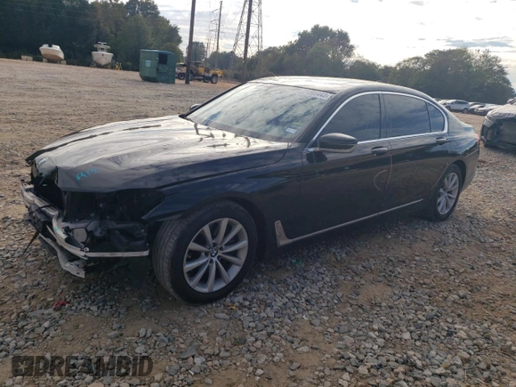 2018 BMW 7 Series 740i xDrive with VIN WBA7E4C5XJGV24003, listed as a Copart auction lot 71395443 with 63,558 mi miles. Bid and sale history available at carsss.com. Image 1.