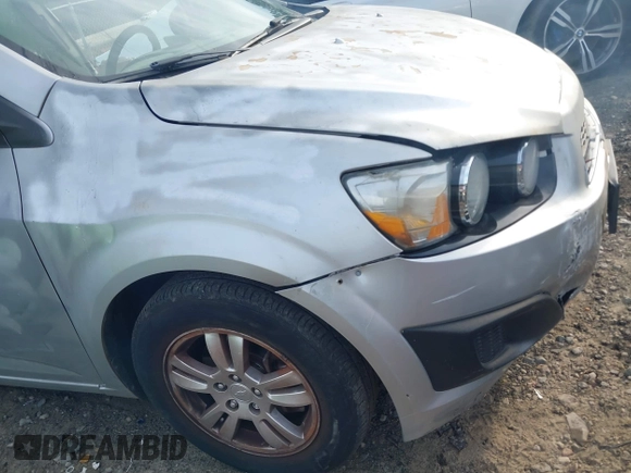 2013 Chevrolet Sonic LT with VIN 1G1JC5SH1D4205197, listed as a IAAI auction lot 41623803 with 153,666 mi miles and . Bid and sale history available at DreamBid. Image 14.