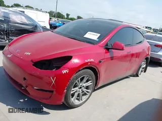 2023 Tesla Model Y Long Range z VIN 7SAYGAEE7PF691499, wystawiony jako IAAI lot #42038850 z przebiegiem 26 439 mil mil oraz . Historia ofert i sprzedaży dostępna na DreamBid. Obrazek 25.
