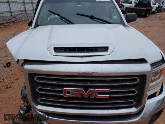 2018 GMC Sierra 2500HD z VIN 1GT12REY5JF232769, wystawiony jako Copart lot #82141064 z przebiegiem Nie podano mil oraz Szkoda całkowita • Salvage title. Historia ofert i sprzedaży dostępna na DreamBid. Obrazek 13.