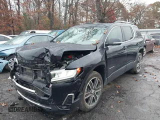 2022 GMC Acadia SLT with VIN 1GKKNMLS1NZ103322, listed as a IAAI auction lot 41033861 with 37,348 mi miles and . Bid and sale history available at DreamBid. Image 21.