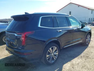 2021 Cadillac XT6 Premium Luxury z VIN 1GYKPDRS8MZ175544, wystawiony jako IAAI lot #41591775 z przebiegiem 39 290 mil mil oraz . Historia ofert i sprzedaży dostępna na DreamBid. Obrazek 4.