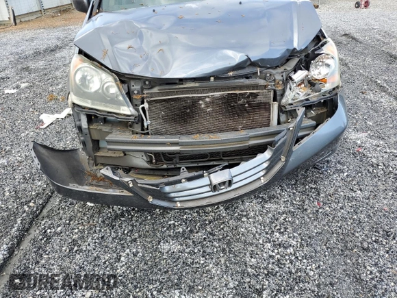 2010 Honda Odyssey EX-L with VIN 5FNRL3H73AB099787, listed as a Copart auction lot 52482325 with 235,785 mi miles and Salvage Title. Bid and sale history available at DreamBid. Image 13.