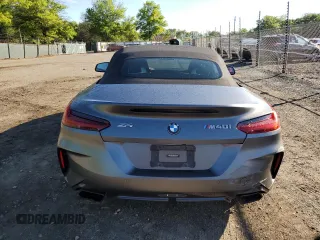 2020 BMW Z4 sDriveM40i z VIN WBAHF9C00LWW76934, wystawiony jako Copart lot #55810755 z przebiegiem 52 230 mil mil oraz Szkody całkowita. Historia ofert i sprzedaży dostępna na DreamBid. Obrazek 6.