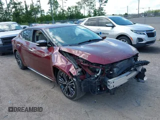 2017 Nissan Maxima SV z VIN 1N4AA6APOHC411463, wystawiony jako IAAI lot #39652799 z przebiegiem 62 683 mil mil oraz . Historia ofert i sprzedaży dostępna na DreamBid. Obrazek 1.