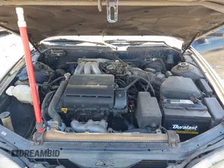 1995 Toyota Camry LE with VIN 4T1GK12E5SU860216, listed as a IAAI auction lot 41803933 with 235,130 mi miles. Bid and sale history available at carsss.com. Image 10.
