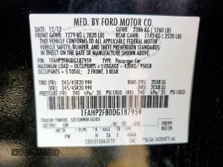 2013 Ford Taurus Limited with VIN 1FAHP2F80DG187959, listed as a Copart auction lot 61686525 with 124,761 mi miles and Clean title. Bid and sale history available at DreamBid. Image 12.